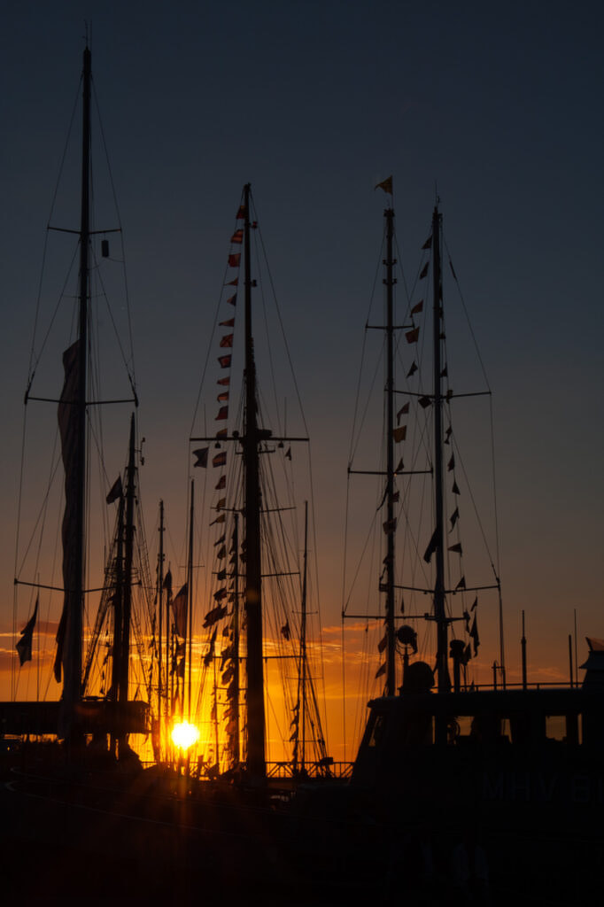 Tall Ships Race at sunset in Ålborg, Denmark.